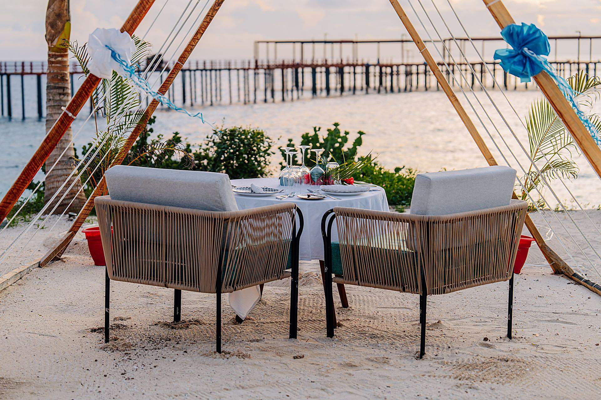 Beach restaurant table at sunset, Jambiani